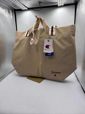 Champion Beige Tote Bag with Black-Trim Handles